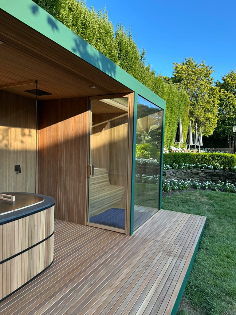 Side angle of custom sauna pavilion with hunter green trims and pool view, Long Branch NJ