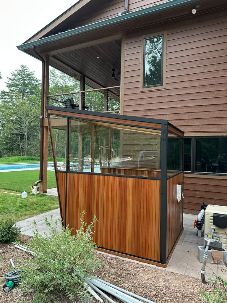 Glass roof sauna beside pool at vacation home, Monticello NY