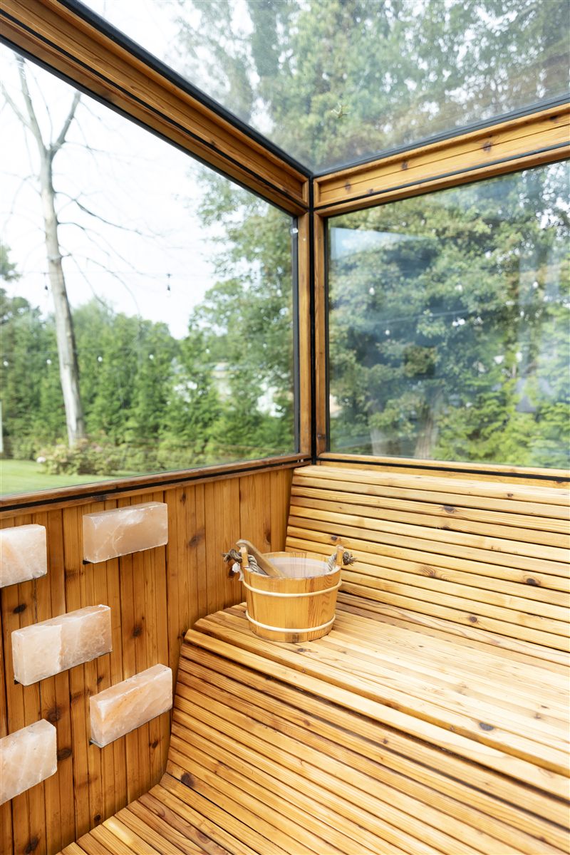 Wide multi-person sauna bench designed for hosting, an example of Cielo's group-scale layout