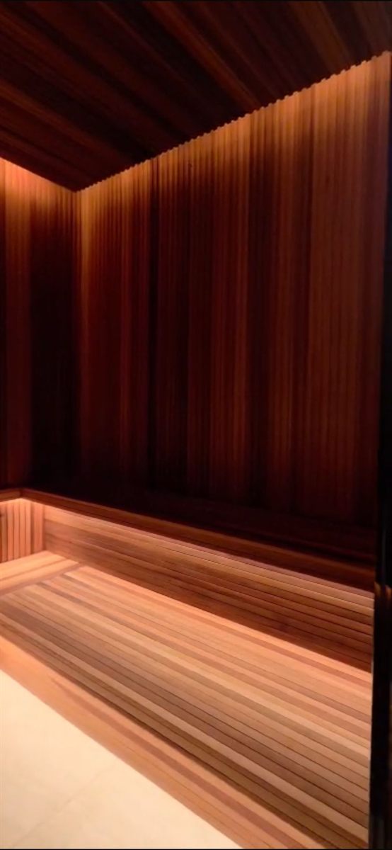 A dimly lit Cielo sauna interior, built for a daily stress-relief practice